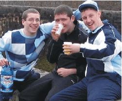 Three chavs and a bottle of white cider. Innit!